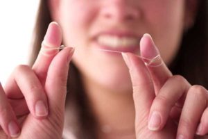 16AugPIAfroum-floss03.scale_.LARGE_-300x200.jpg